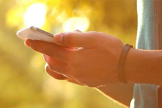Man holds smartphone in his hands