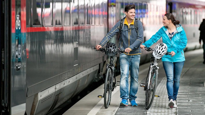 Couple on the platform with bicycles